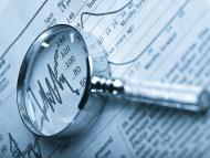 magnifying glass on a graph