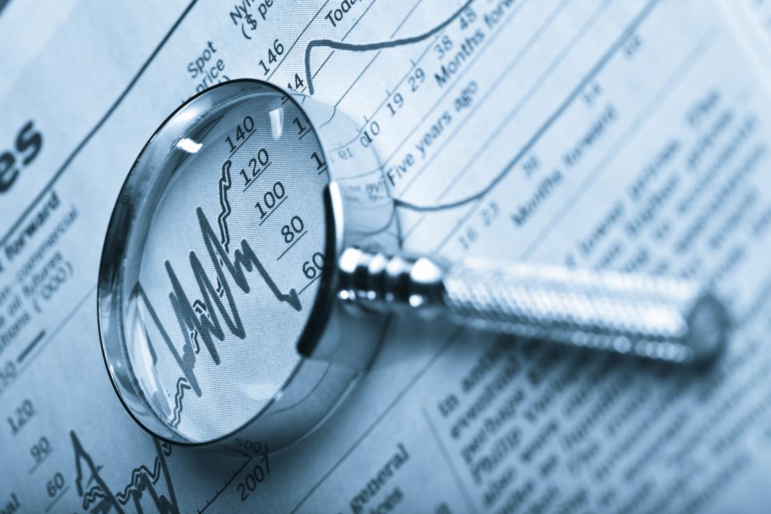 magnifying glass on a graph